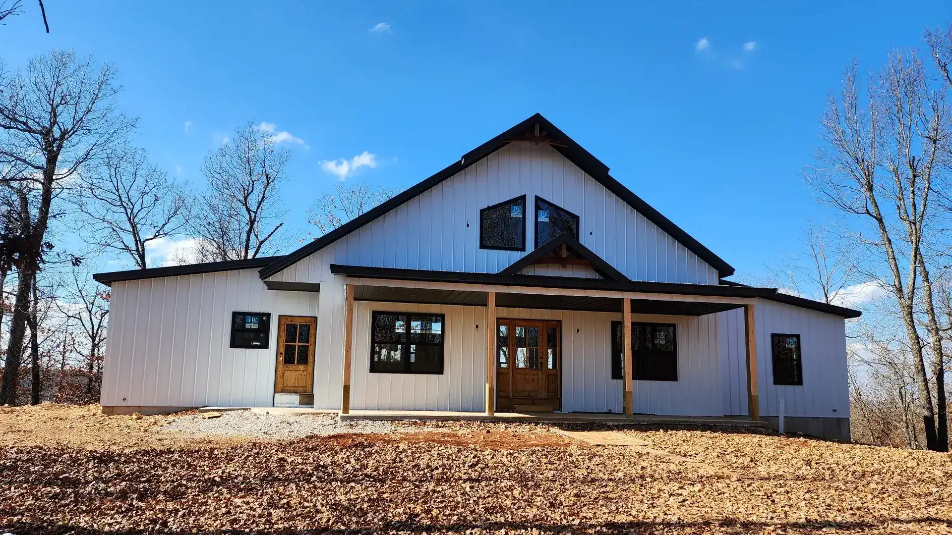 Custom building with timber frame entry